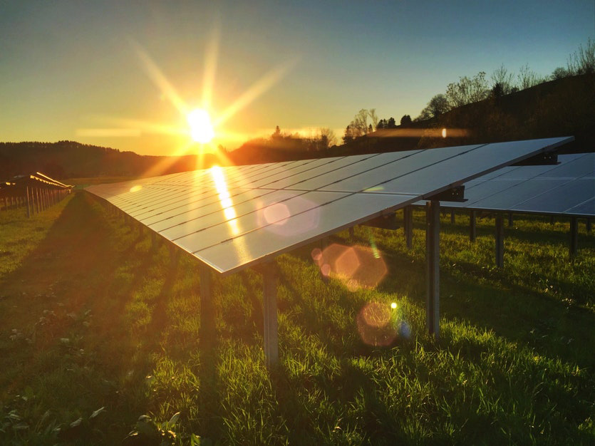 Sunset view over solar panels at the Lightsource bp project on Inkersall Grange Farm in Bilsthorpe, Nottinghamshire, part of their UK Projects portfolio.